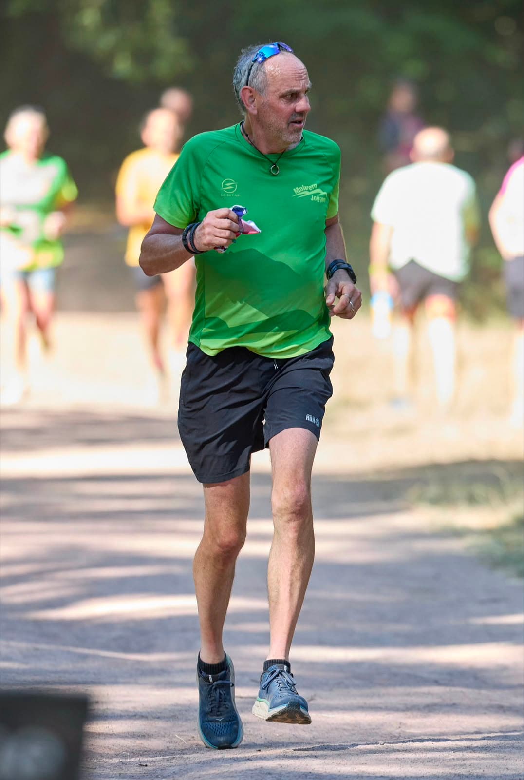 A member running at his own pace through the woods